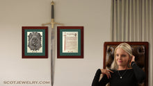 Load image into Gallery viewer, Clan Cumming Crest and History Prints Framed on Wall
